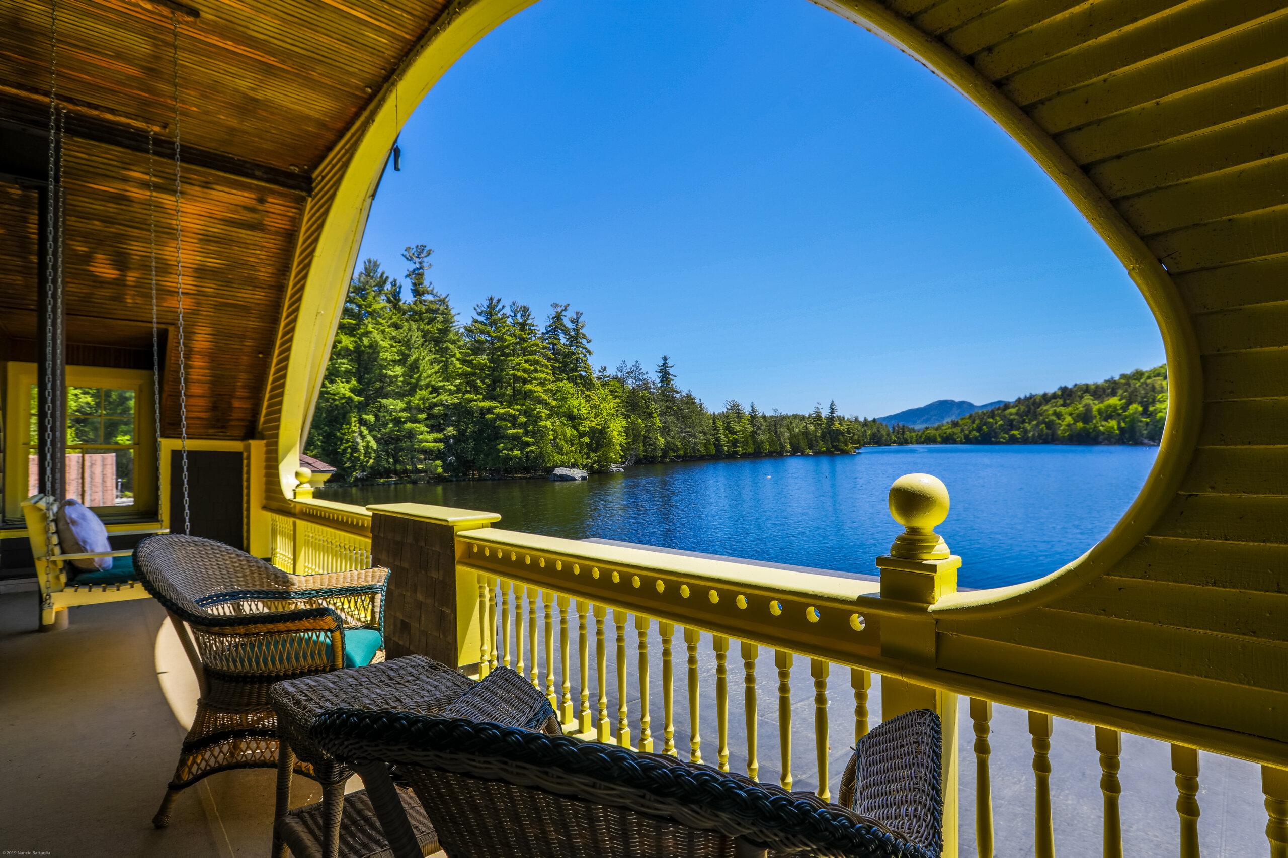 Lakefront view from the deck of an Adirondack home